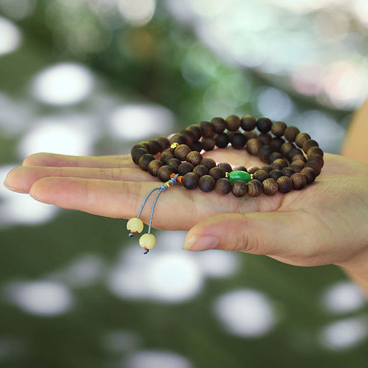 Buddha Stones 108 Mala Beads Nha Trang Bai Qinan Agarwood Cyan Jade Amber Strength Meditation Bracelet