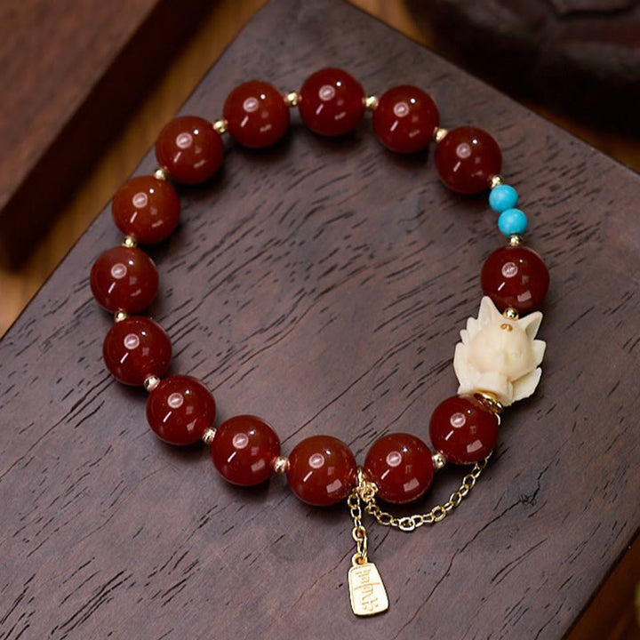 Buddha Stones Nine Tailed Fox Joy Red Agate Ivory Fruit Copper Plated Gold Confidence Bracelet