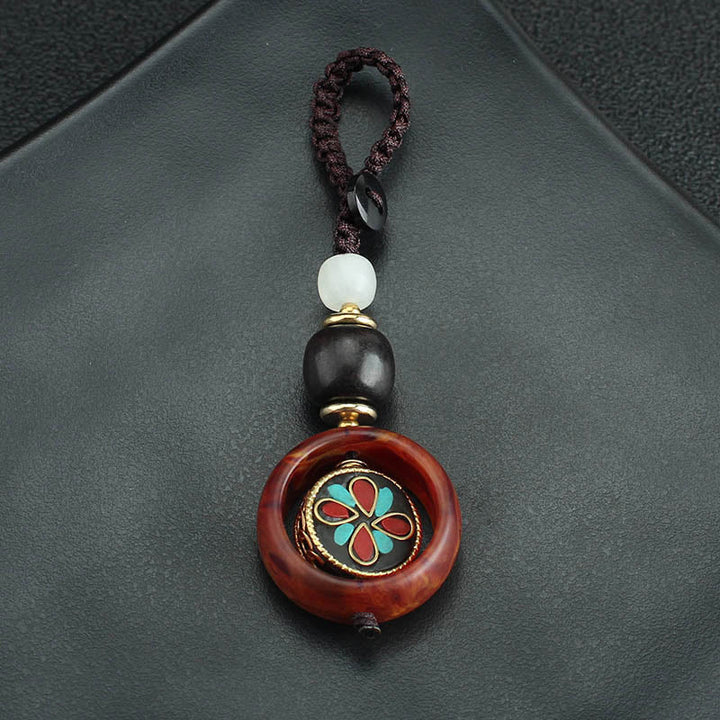 Buddha Stones Ebony Wood Sanskrit Four-leaf Clover Buddha's Eye Peace Rotatable Key Chain - image 9
