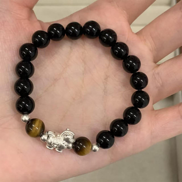 Buddha Stones Year Of The Horse 999 Sterling Silver Horse Charm Black Obsidian Tiger Eye Strength Bracelet - 10mm - image 0