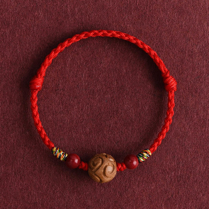 Buddha Stones Carved Auspicious Pattern Natural Peach Wood Rope Luck Bracelet - Red Rope(Wrist Circumference: 13-18cm) - image 1