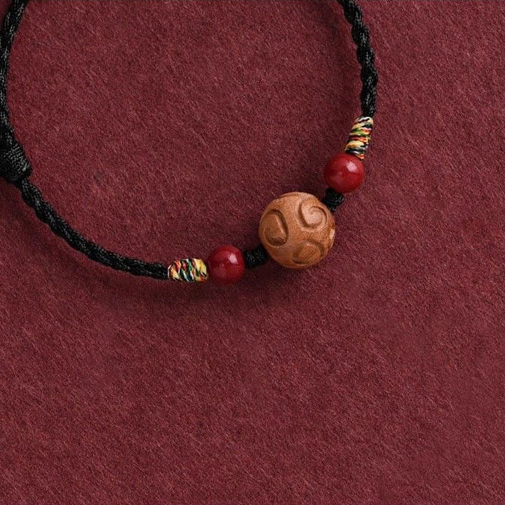 Buddha Stones Carved Auspicious Pattern Natural Peach Wood Rope Luck Bracelet - image 14