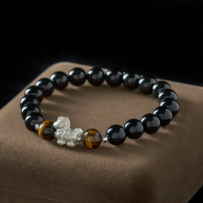Buddha Stones Year Of The Horse 999 Sterling Silver Horse Charm Black Obsidian Tiger Eye Strength Bracelet - 10mm - image 0
