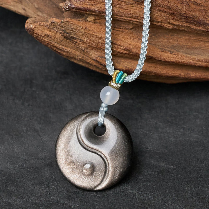 Buddha Stones Silver Sheen Obsidian Yin Yang Symbol Protection Necklace Pendant - image 1