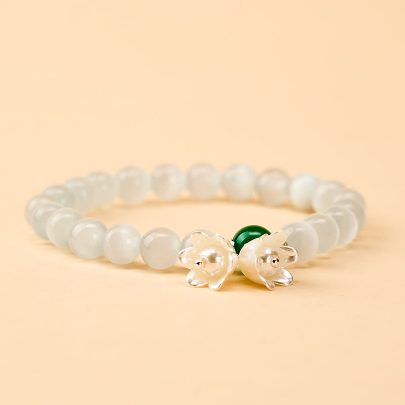 Buddha Stones 8mm White Cat's Eye Round Beads Lily of the Valley Flowers Positive Bracelet - image 1