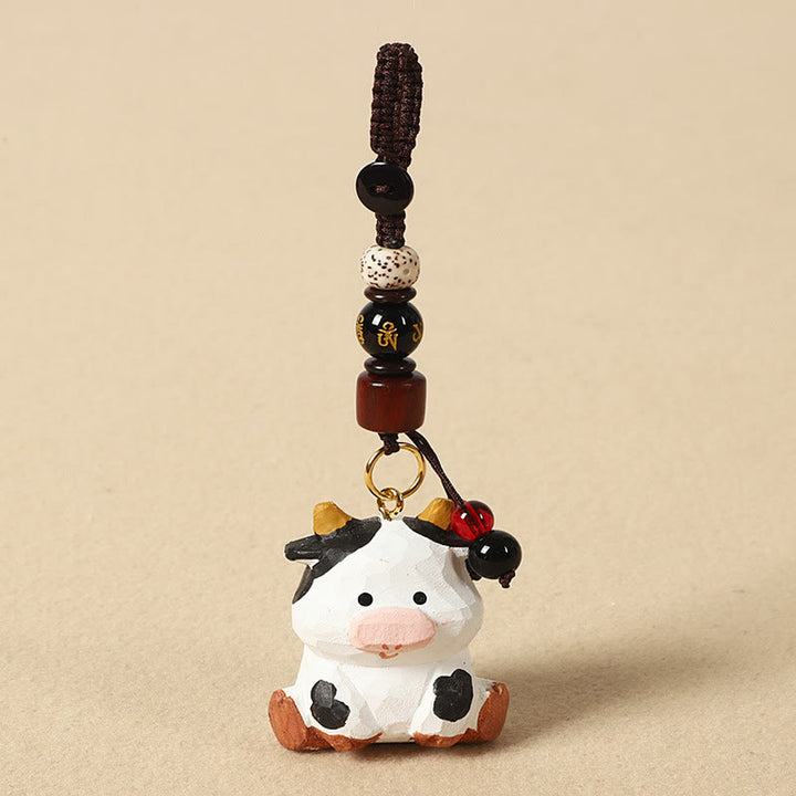 Buddha Stones Chinese Zodiac Linden Wood Engraved Plum Blossom Peace Safe Om Mani Padme Hum Positive Key Chain - Ox 4cm(Color Shape and Size May vary) - Om Mani Padme Hum - image 10