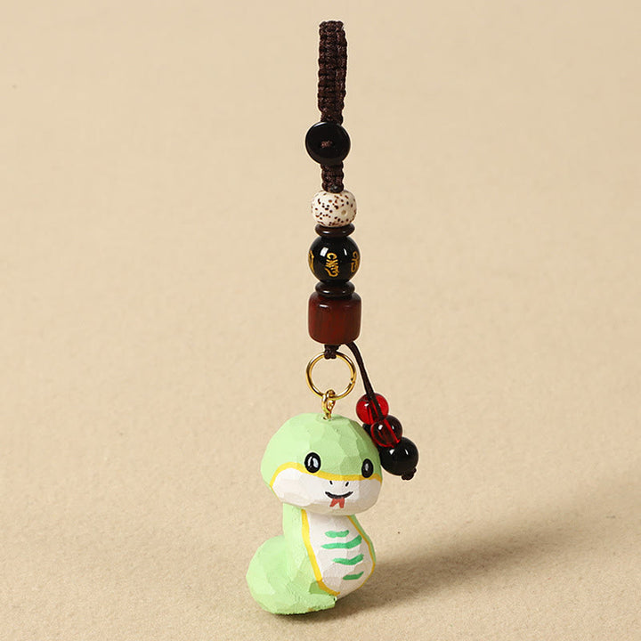 Buddha Stones Chinese Zodiac Linden Wood Engraved Plum Blossom Peace Safe Om Mani Padme Hum Positive Key Chain - Snake 4cm(Color Shape and Size May vary) - Om Mani Padme Hum - image 22