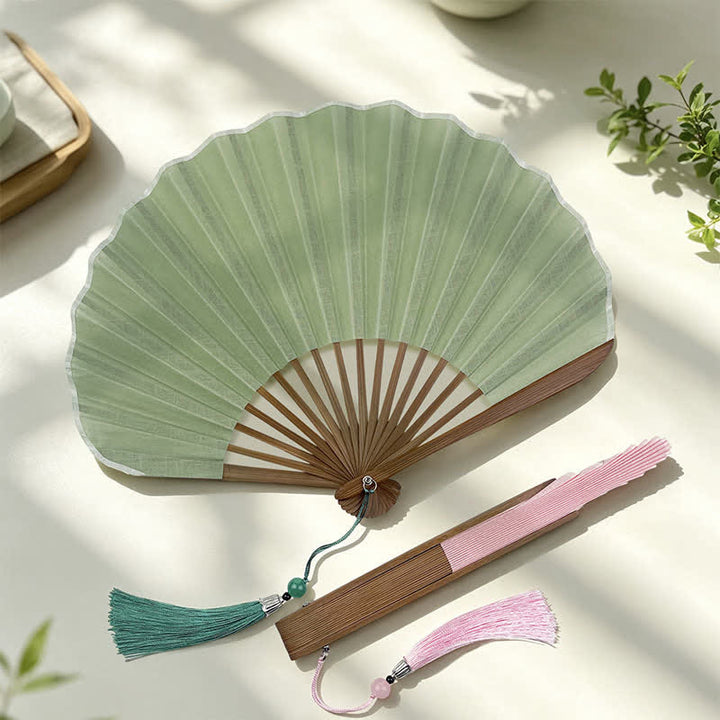 Buddha Stones Cotton Linen Bamboo Shell-shaped Tassel Folding Fan 21.5 cm - image 0