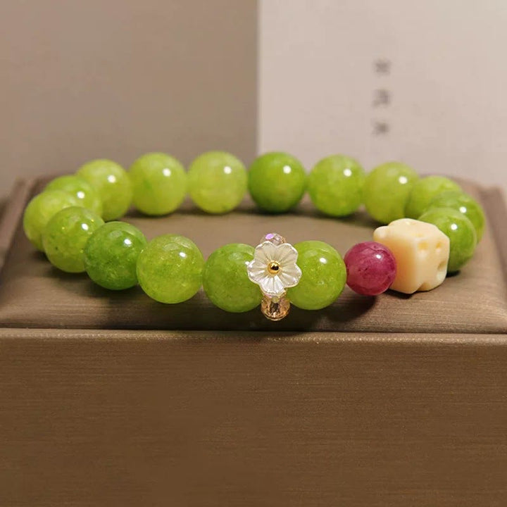 Buddha Stones Peridot Flower Charm Healing Beaded Bracelet - Peridot(Wrist Circumference: 6.3–6.7 in / 16–17 cm) - image 0