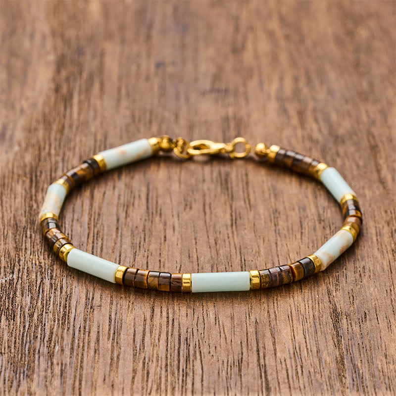 Buddha Stones Red Network Stone Tiger Eye Barrel Beads Confidence Bracelet - 7.9–8.2 in (20–21 cm) - image 0
