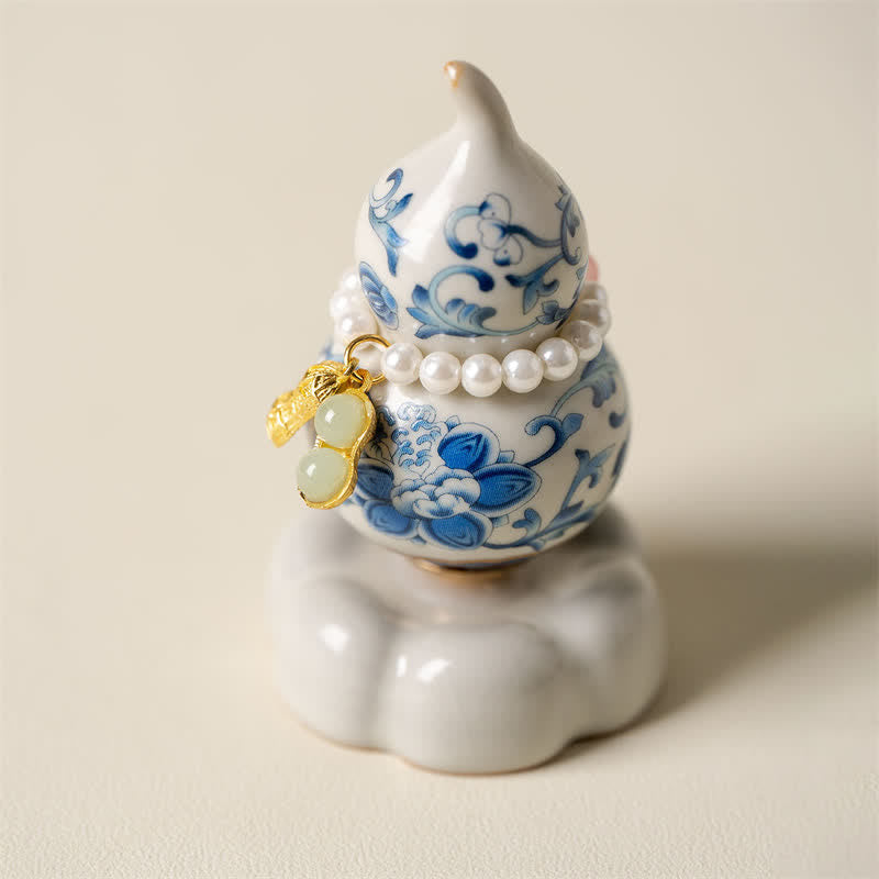 Buddha Stones Blue and White Ceramic Rotating Gourd Lotus Mindful Living Decor - White Base Approx. 4.8 cm × 4.8 cm × 8.5 cm - image 0