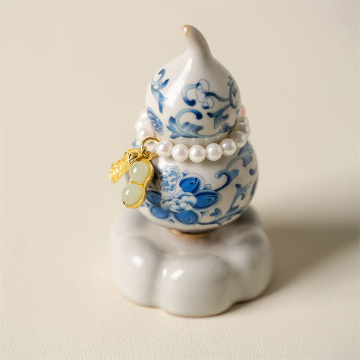 Buddha Stones Blue and White Ceramic Rotating Gourd Lotus Mindful Living Decor - White Base Approx. 4.8 cm × 4.8 cm × 8.5 cm - image 0