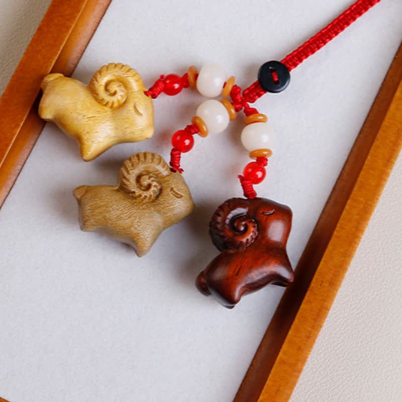 Buddha Stones Hand-Carved Sandalwood Ebony Wood Three Goats Prosperity Keychains - image 2