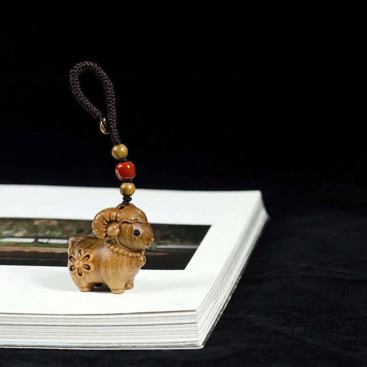 Buddha Stones Rainbow Eucalyptus Sandalwood Goat Serenity Hand-Carved Keychains - Green Sandalwood - Braided Rope - image 6