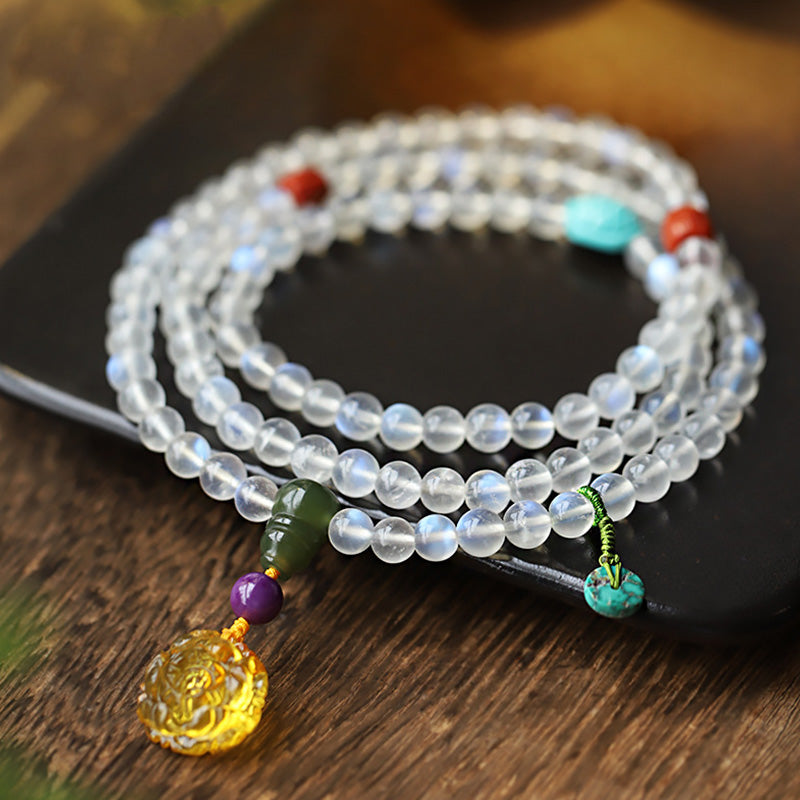 Buddha Stones 108 Mala Beads Moonstone Amber Lotus Turquoise Crystal Healing Bracelet - Moonstone(Glow Varies – Subtle to Strong) - image 0