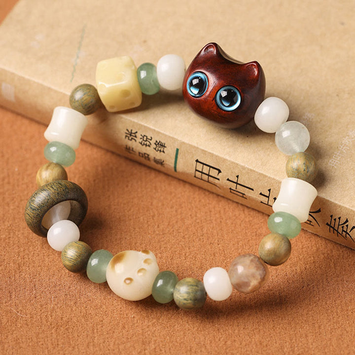Buddha Stones Bodhi Seed Green Sandalwood Ebony Wood Small Leaf Red Sandalwood Cat Head Paw Claw Peace Bracelet - image 11