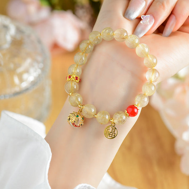 Buddha Stones Natural Golden Rutilated Quartz Fu Character Charm Bell Wealth Bracelet