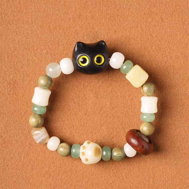 Buddha Stones Bodhi Seed Green Sandalwood Ebony Wood Small Leaf Red Sandalwood Cat Head Paw Claw Peace Bracelet - Ebony Wood Cat(Yellow Eyes)(Wrist Circumference 14-16cm) - image 15