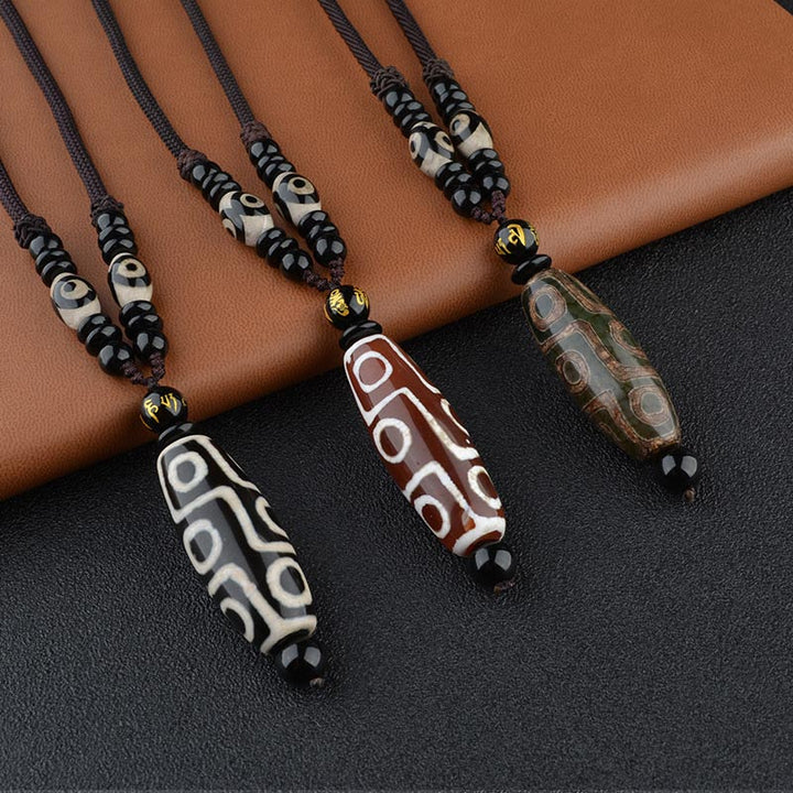 Buddha Stones Nine-Eye Dzi Bead Wealth Protection Necklace - image 0