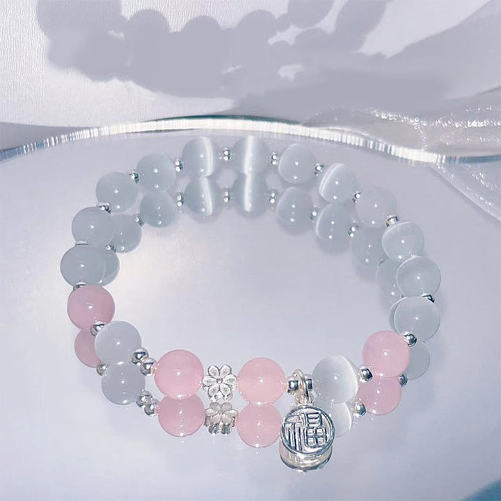 Buddha Stones Cat's Eye Crystal Peach Blossom Bell Fu Character Charm Support Bracelet