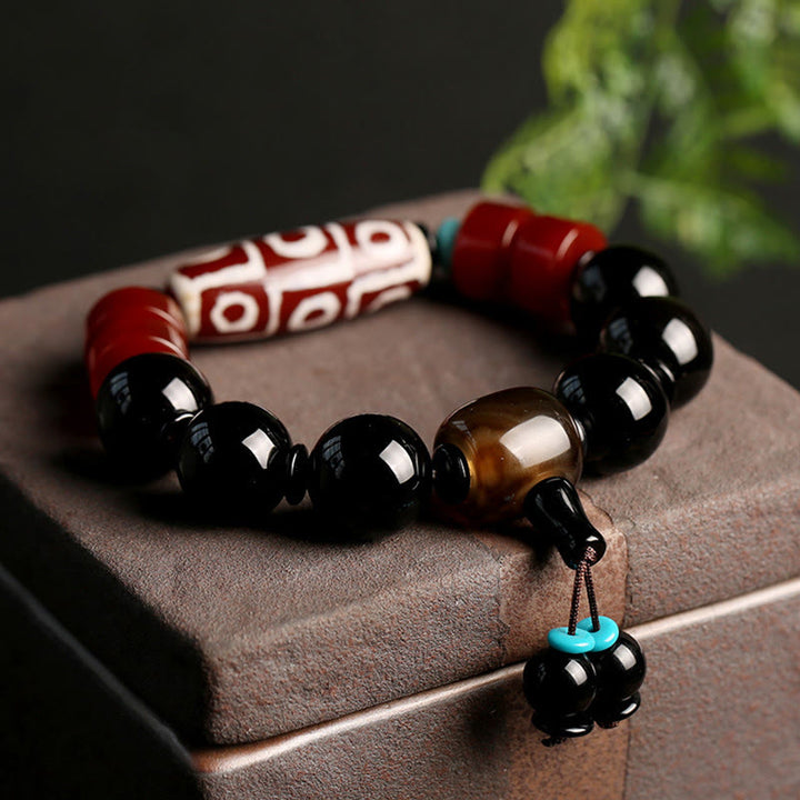 Tibetan Nine-Eye Dzi Bead Black Onyx Wealth Protection Bracelet