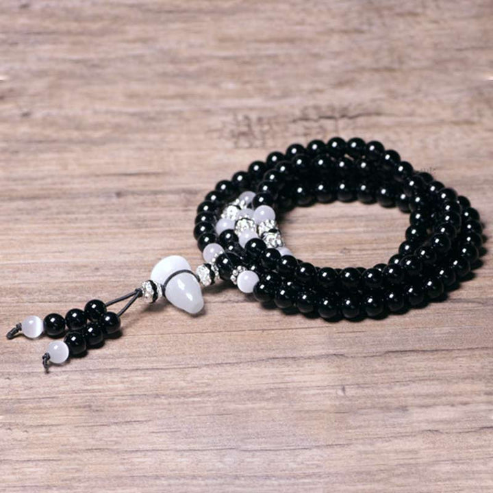 Black Onyx White Crystal Bead Meditation Bracelet