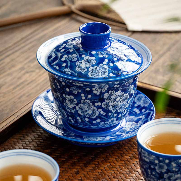 Buddha Stones Plum Blossom Blue And White Porcelain Ceramic Gaiwan Sancai Teacup Kung Fu Tea Cup And Saucer With Lid 185ml