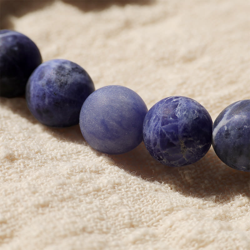 Buddha Stones Sodalite Ivory Fruit Dancing Lion Crescent Moon Harmony Bracelet