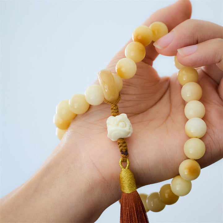 Buddha Stones Natural Bodhi Seed Ivory Fruit Dancing Lion Charm Harmony Tassel Wrist Mala