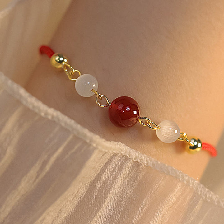 Buddha Stones Red Agate Cat Eye Braided String Confidence Bracelet