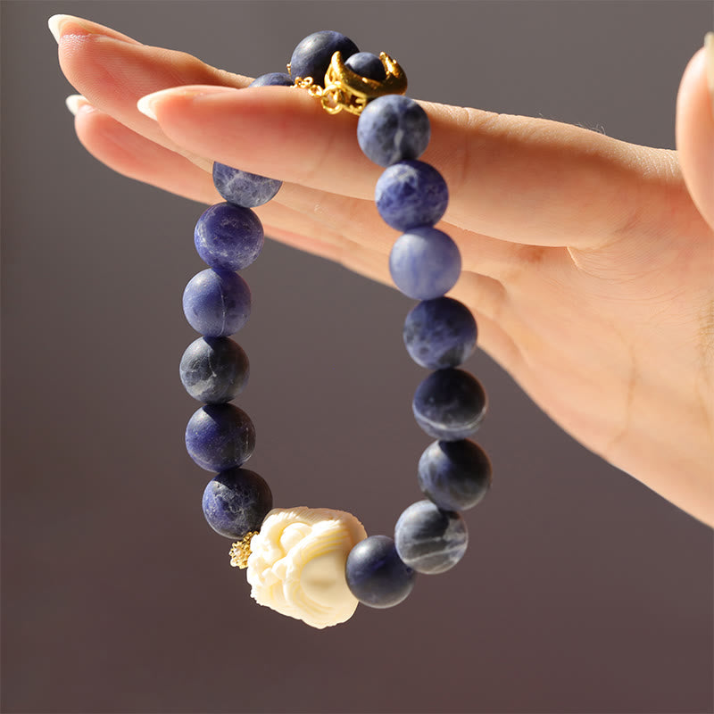 Buddha Stones Sodalite Ivory Fruit Dancing Lion Crescent Moon Harmony Bracelet