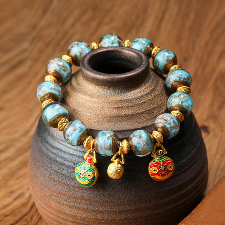 Buddha Stones Gold Swallowing Beast Family Charm Liuli Glass Bead Fortune Bracelet