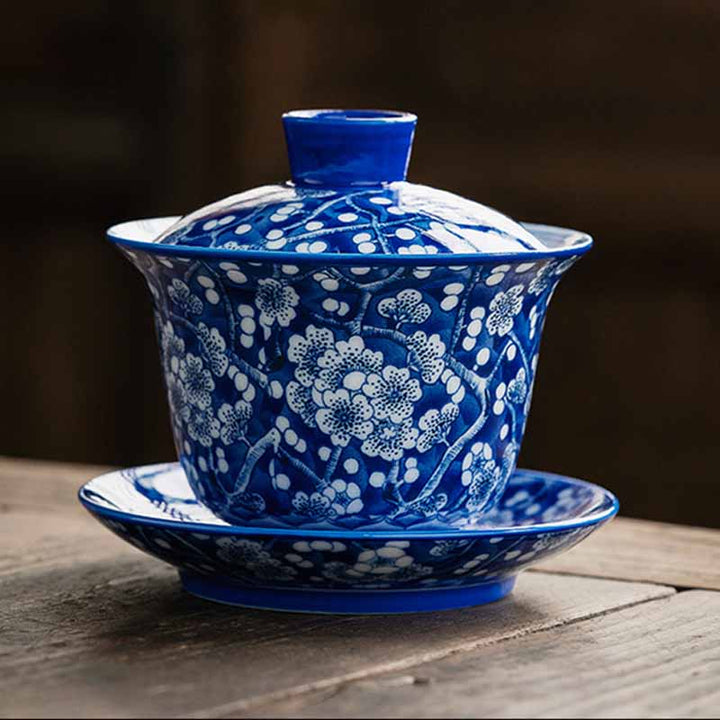 Buddha Stones Plum Blossom Blue And White Porcelain Ceramic Gaiwan Sancai Teacup Kung Fu Tea Cup And Saucer With Lid 185ml