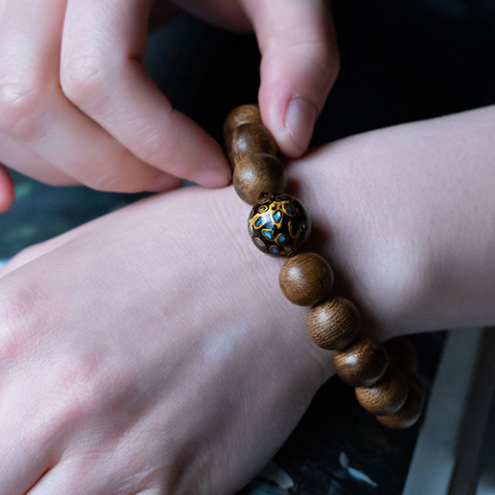 Tarakan Agarwood Amber Red Agate Laughing Buddha Strength Meditation Bracelet