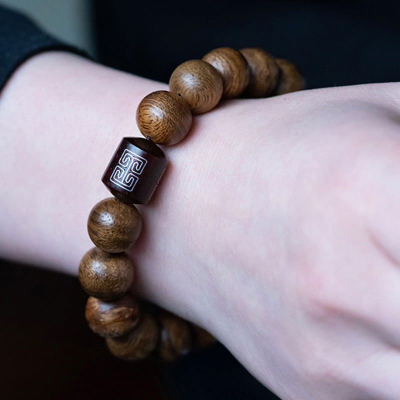 Tarakan Agarwood Amber Red Agate Laughing Buddha Strength Meditation Bracelet