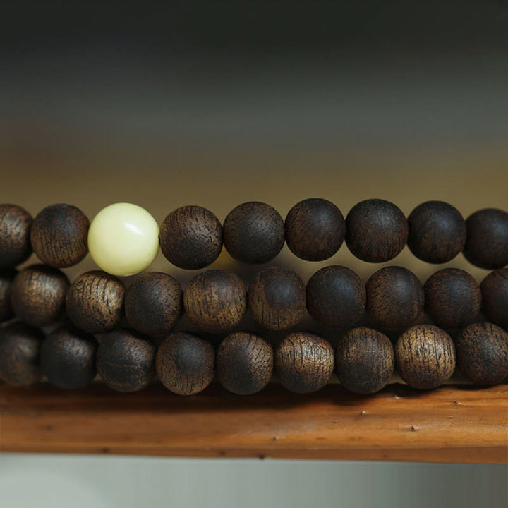 Buddha Stones 999 Gold Tarakan 108 Mala Beads Agarwood Amber Ward Off Evil Spirits Bracelet