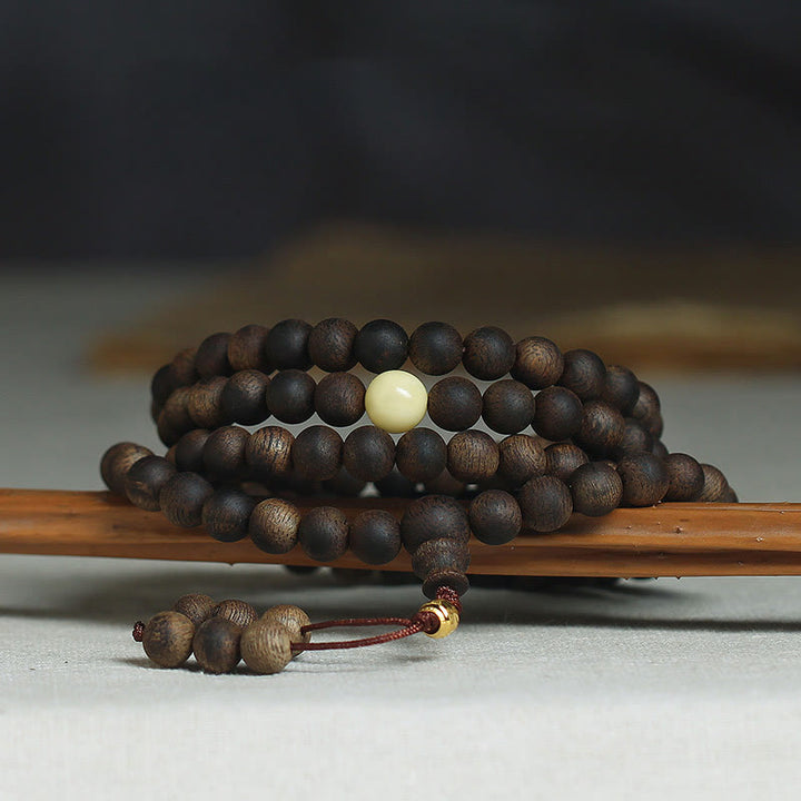 Buddha Stones 999 Gold Tarakan 108 Mala Beads Agarwood Amber Ward Off Evil Spirits Bracelet