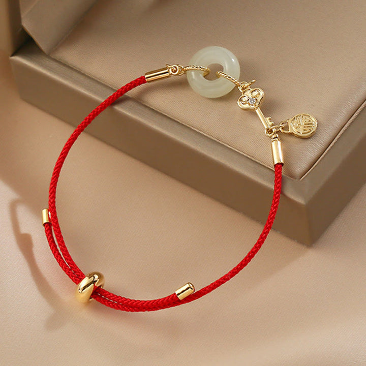 Buddha Stones 18K Gold Plated Hetian Jade Peace Buckle Fu Character Luck Red Rope Bracelet