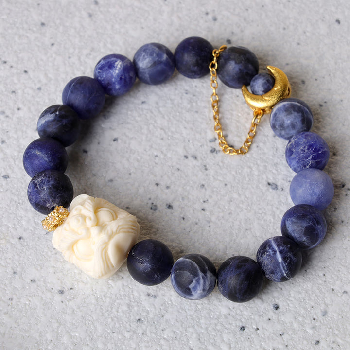 Buddha Stones Sodalite Ivory Fruit Dancing Lion Crescent Moon Harmony Bracelet