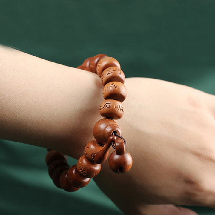 Buddha Stones Natural Tibetan Peach Wood Om Mani Padme Hum Engraved Ward Off Evil Spirits Bracelet