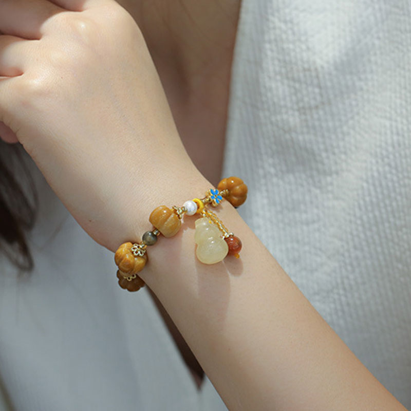 Buddha Stones Golden Silk Jade Pixiu Wealth Bracelet