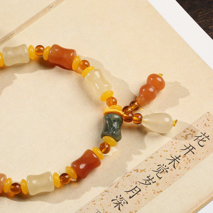 Natural Golden Silk Jade Gourd Wealth Charm Bracelet